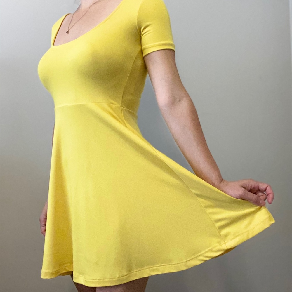Bright yellow, fun, playful, mini dress.